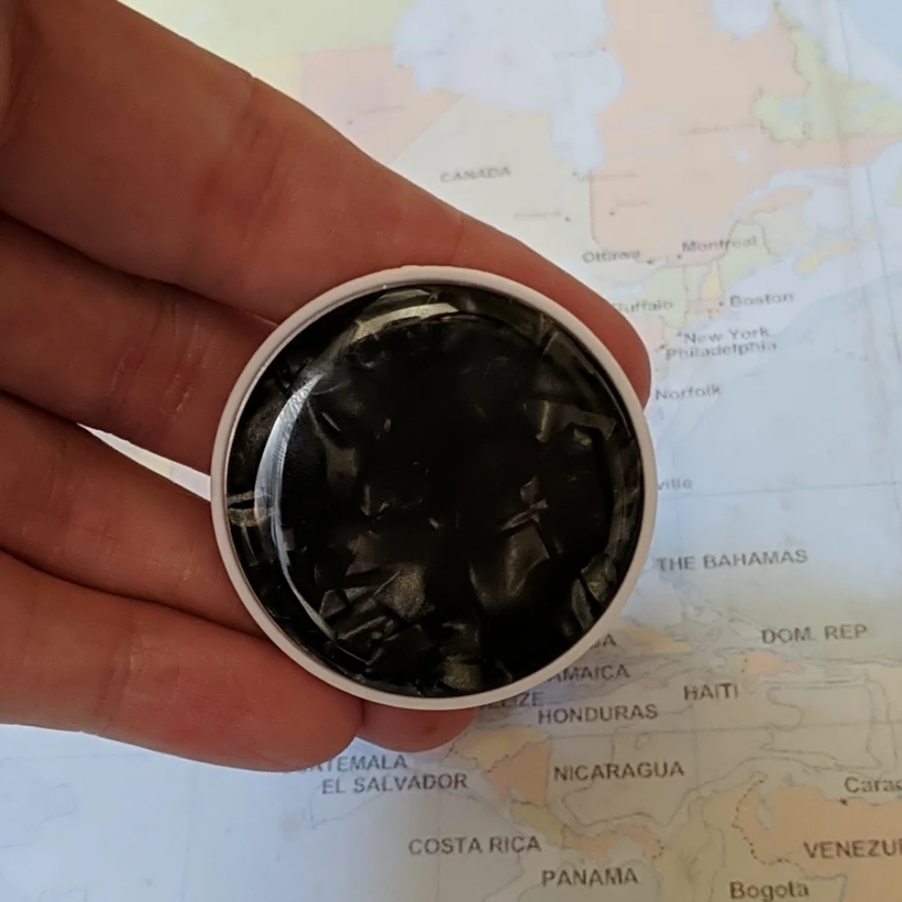 Black marble phone holder